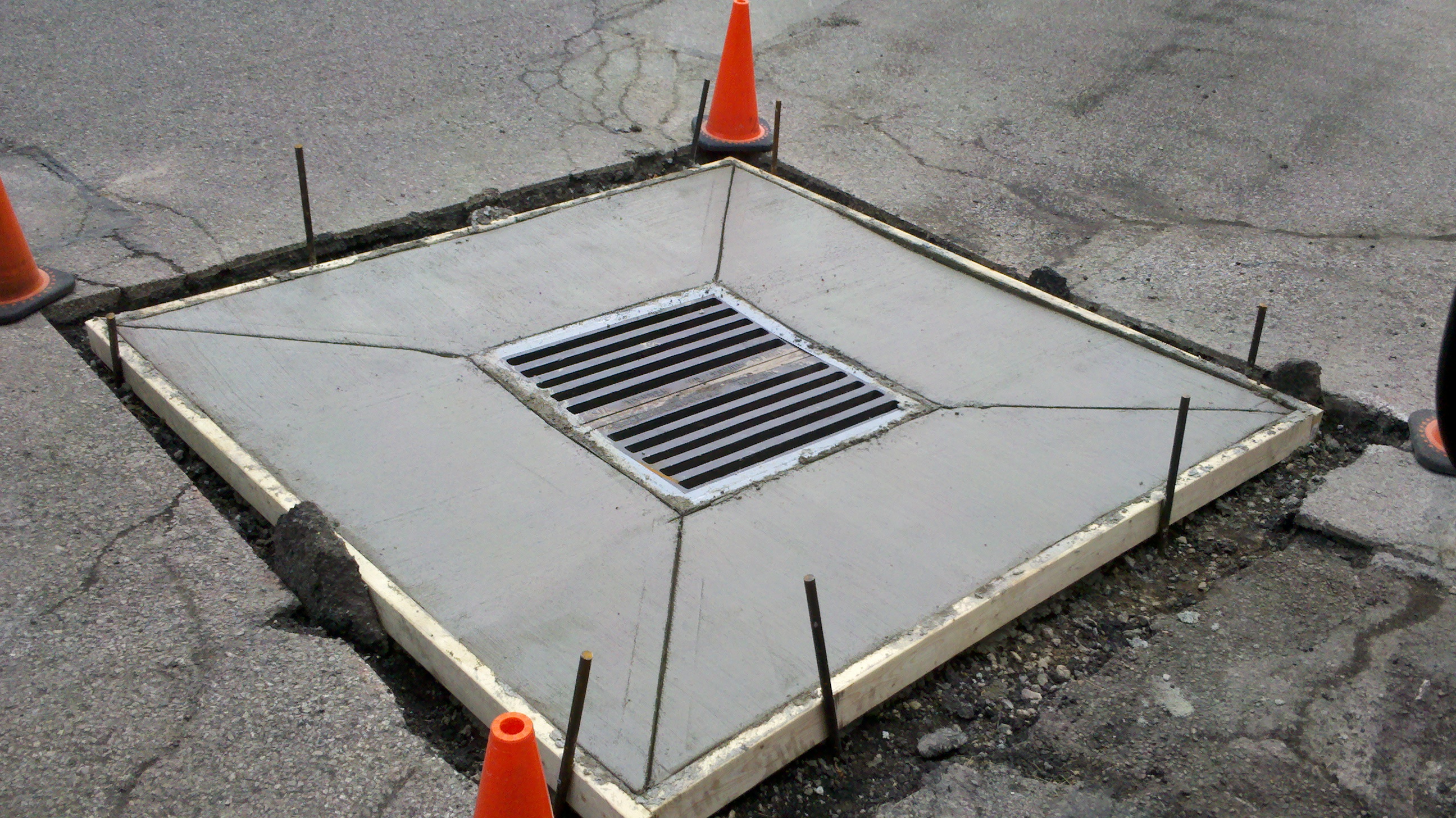 New Concrete Catch Basin - Smith & Sons Sealcoating & Striping Inc.